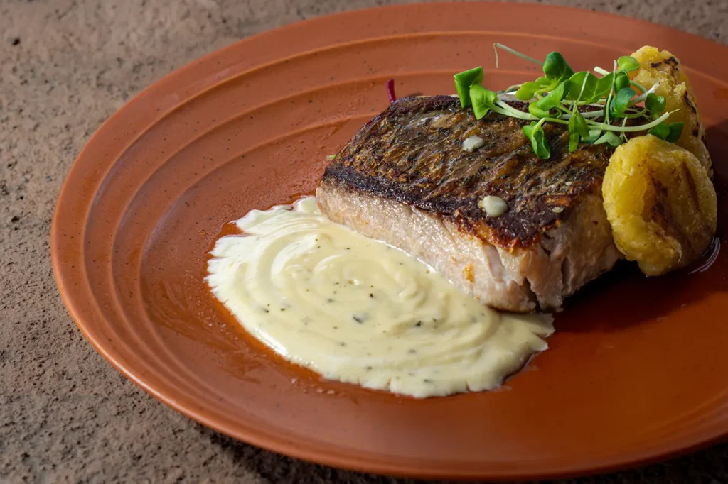 Sayan House Ubud signature dish with rice fields view